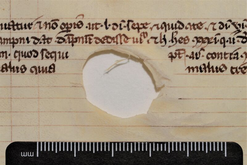 File:Parchment hole.jpg