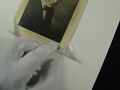 Folded paper corners for matted photographs