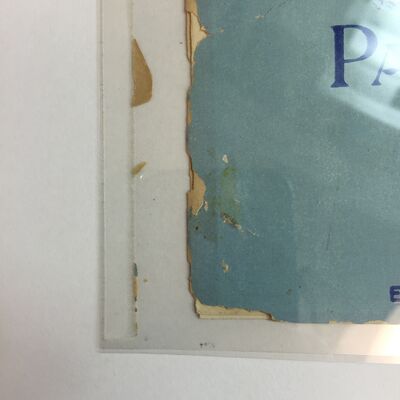 The result of housing paper materials between Mylar sheets adhered with double-stick tape