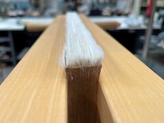 Individual kozo flanges adhered to each leaf. Before rounding.