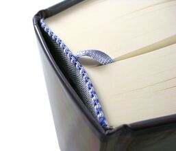 Stuck-on endband on a modern book