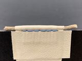 Model of a saddle stitch endband (back)