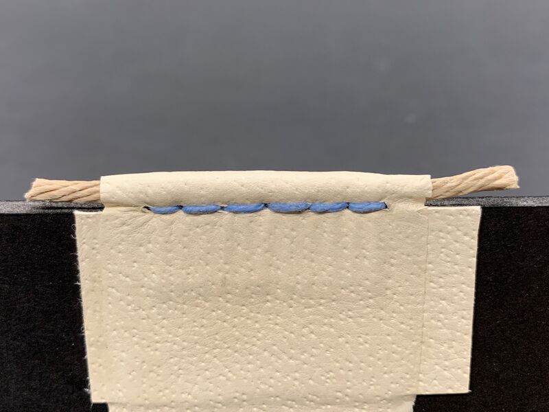 File:SaddleStitchEndbandBack.JPG