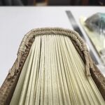 Practice model of a Byzantine-style endband, in linen thread over cord.