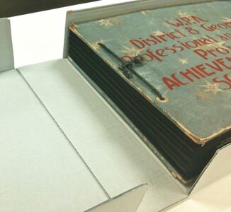 Scrapbook in a custom-sized enclosure. Georgia Archives.