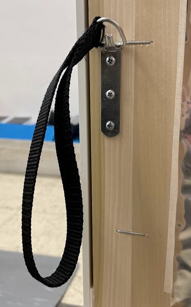 File:Strap attached to d ring.jpg