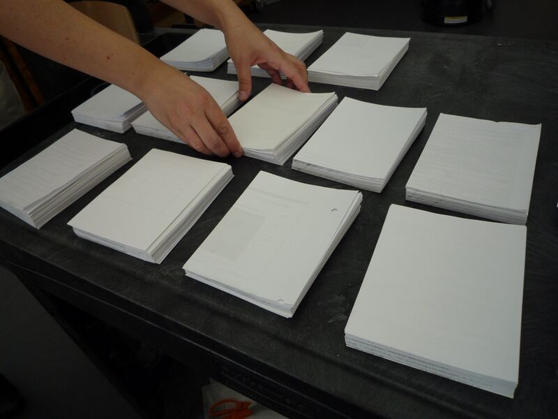 File:Organizingpaperpiles.JPG