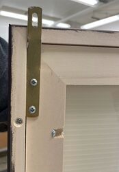 A type of security hanging hardware, which gets screwed directly into the wall to prevent theft.