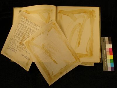 Failure of adhesives on scrapbook pages. YMCA Scrapbook, Box 4, University Archives, University of Illinois. Photo credit: Emily F. Shaw
