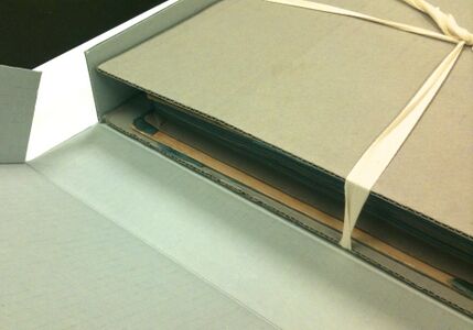 Scrapbook in a custom-sized enclosure with support boards. Georgia Archives.