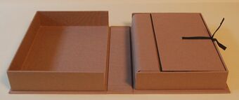 Drop spine cradle box with box open and cradle folded. Photograph by Jeff Peachey. 2009.