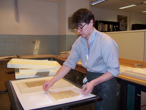 Blotting folia after sizing and then putting under felts & weight to dry
