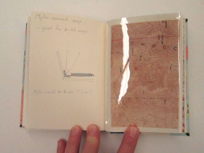 Small map, encapsulated in polyester, bound into book model. Made by Katherine Kelly 2006